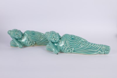 Lot 707 - A pair of turquoise glazed pottery figures of...