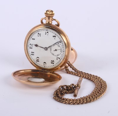 Lot 37 - A Dennison gold plated half hunter pocket...