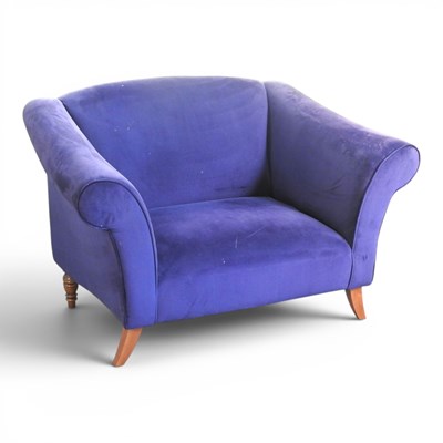 Lot 129 - A modern blue upholstered sofa, on sabre legs
