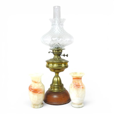 Lot 245 - A 19th century brass oil lamp, with a glass...