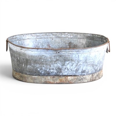 Lot 634 - A large galvanised oval planter, with handles,...