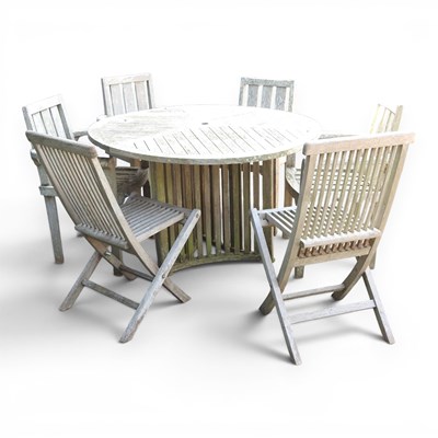Lot 380 - A teak circular garden table, 120cm in...