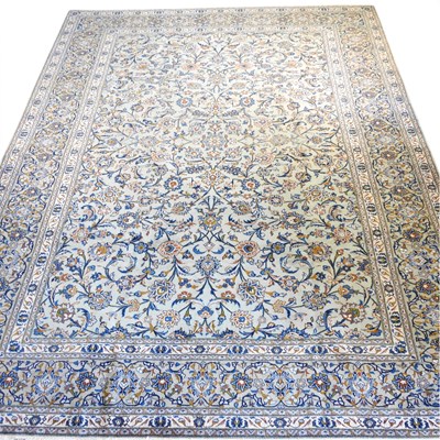 Lot 511 - A Persian kashan carpet, with foliate designs,...