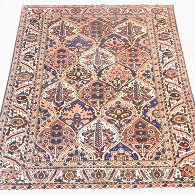 Lot 195 - A Persian Bakhtiar rug, with all over floral...