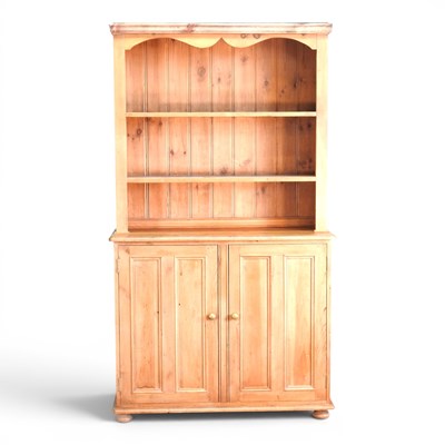 Lot 322 - An antique pine dresser, with a boarded back