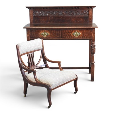 Lot 148 - An early 20th century oak side table, with a...
