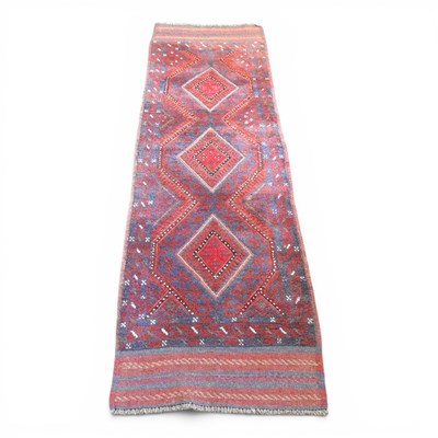Lot 638 - A Persian runner, with three central diamonds,...