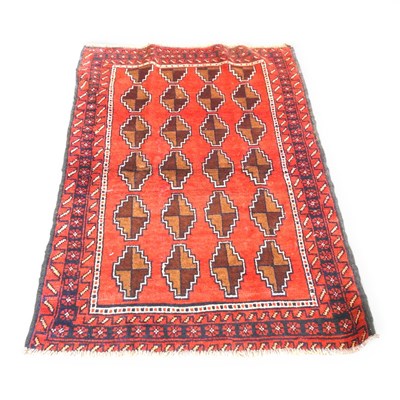 Lot 498 - A baluchi rug, with four rows of diamonds on a...