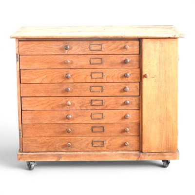 Lot 210 - An early 20th century pine plan chest,...