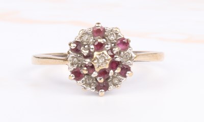 Lot 26 - A 9 carat yellow gold ruby and diamond cluster...