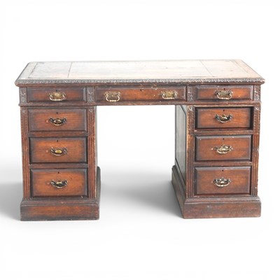 Lot 571 - An early 20th century carved oak pedestal desk,...