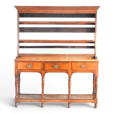 Lot 78 - An 18th century oak dresser, with an open...