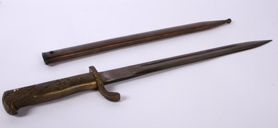 Lot 84 - A German bayonet, the grip in the form of an...