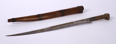 Lot 73 - A Middle Eastern flyssa, having an etched...