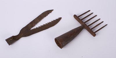 Lot 677 - Two iron eel catching spear heads