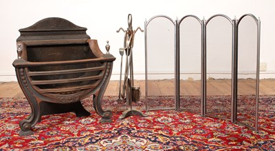 Lot 523 - A cast iron fire basket, with a spark guard...