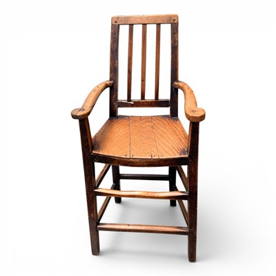 Lot 635 - A 19th century elm seated child's high chair