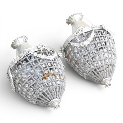 Lot 639 - A pair of modern metal chandeliers, of...
