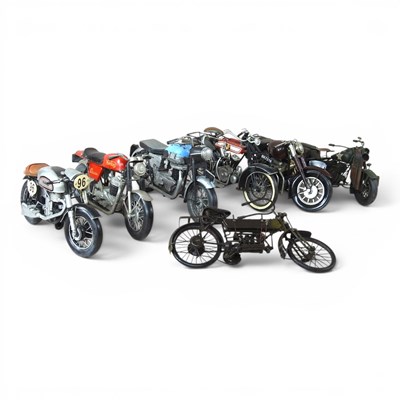 Lot 213 - A collection of tinplate models of motorcycles,...