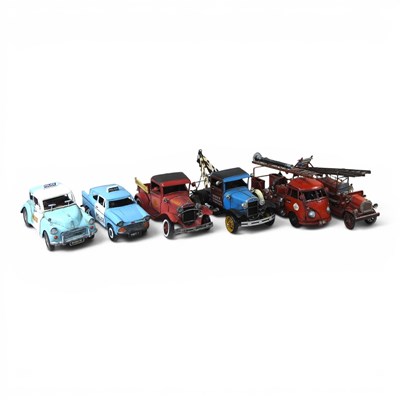 Lot 513 - A collection of model tin plated vehicles, to...
