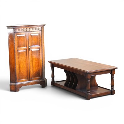 Lot 325 - An oak coffee table, 121cm wide, together with...