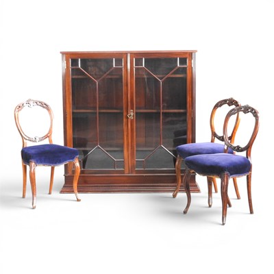 Lot 505 - An early 20th century mahogany glazed bookcase,...
