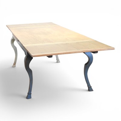 Lot 175 - A large French fruitwood draw leaf extending...