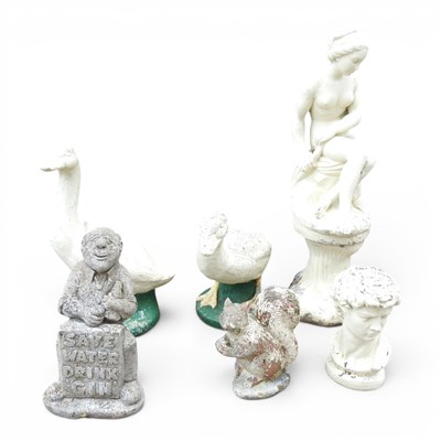 Lot 512 - A painted cast stone garden statue of Miranda,...