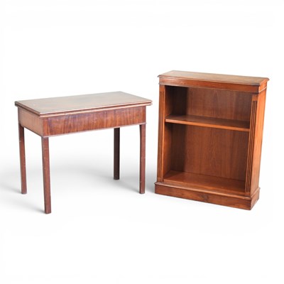 Lot 550 - A George III mahogany folding tea table, on...