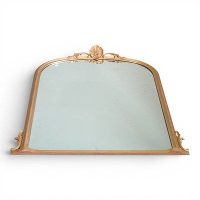 Lot 491 - A gilt framed over mantel mirror, of arched...