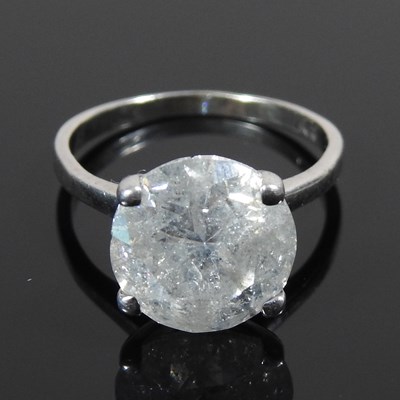 Lot 50 - A large diamond solitaire ring, the central...