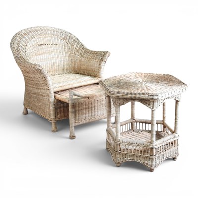 Lot 167 - A wicker armchair with a footrest, together...