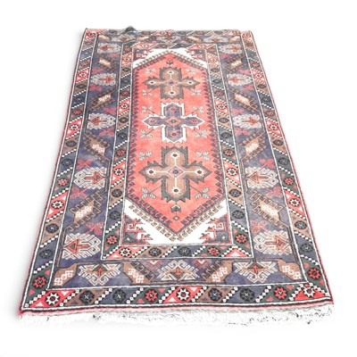 Lot 260 - A Turkish rug, with geometric designs, within...