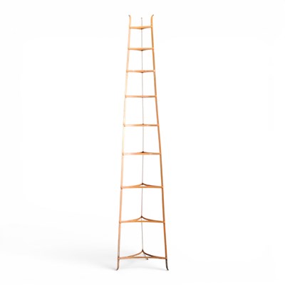 Lot 207 - A graduated iron pan stand, 192cm high