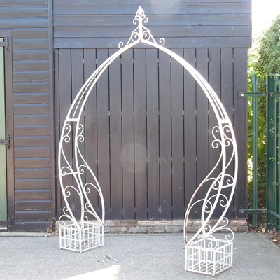 Lot 64 - A large white painted metal garden arch