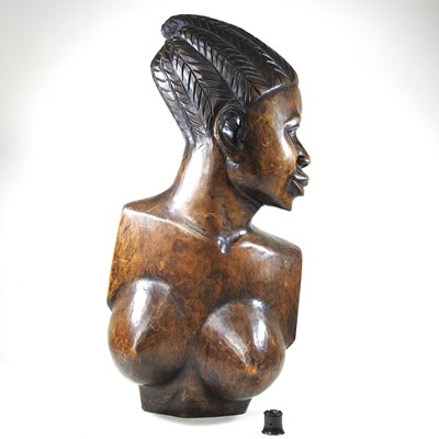 Lot 111 - A mid 20th century African carved portrait bust