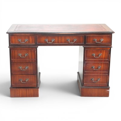 Lot 327 - A reproduction yew wood pedestal desk, with a...