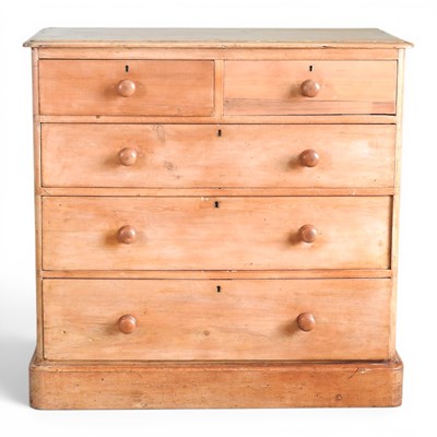 Lot 318 - An antique pine chest of drawers, on a plinth...