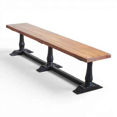 Lot 259 - An oak bench, on a painted trestle base