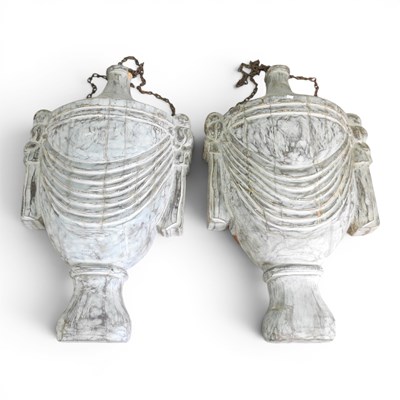 Lot 18 - A pair of large wooden wall decorations, of...