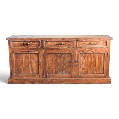 Lot 257 - A hardwood sideboard, by Lombok, containing...