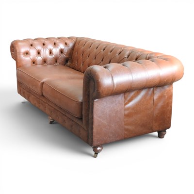 Lot 40 - A Thomas Lloyd brown upholstered chesterfield...
