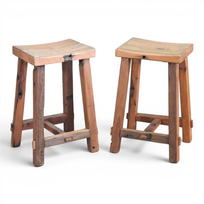 Lot 223 - A pair of Eastern rustic hardwood stools, each...