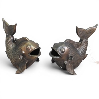 Lot 165 - A pair of metal sculptures of fish, 49cm long (2)