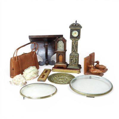 Lot 558 - A mantel clock, in the form of a miniature...