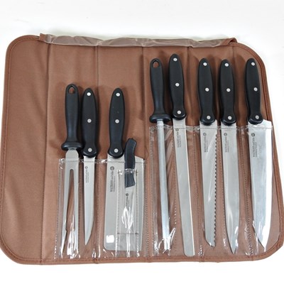 Lot 483 - A new nine piece chef's knife set, cased