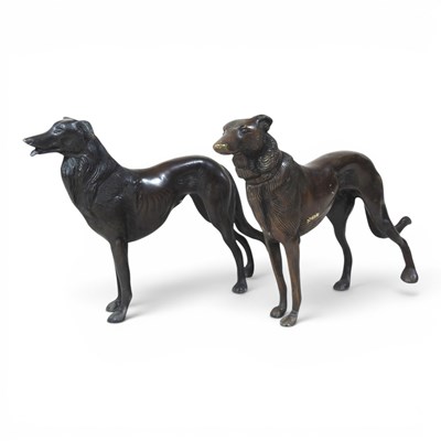 Lot 225 - A modern bronze model of a dog, together with...