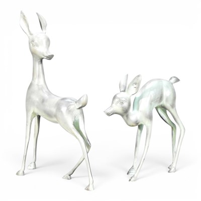 Lot 567 - A verdigris cast metal sculpture of a deer,...