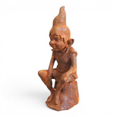 Lot 398 - A rusted garden statue of a seated goblin,...