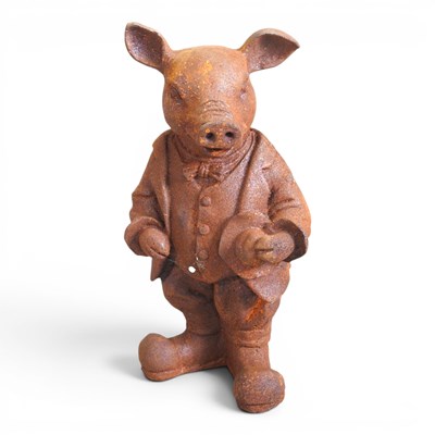 Lot 263 - A rusted metal garden statue of Mr Pig, 44cm high